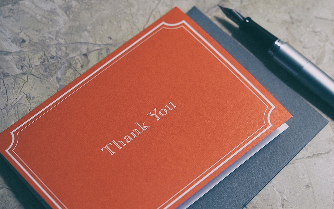 Thank you card with fountain pen - by Aaron Burden (via Unsplash